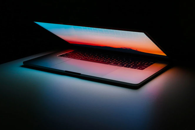 MacBook Pro aluminates in dark room