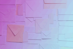 A collection of mailing envelopes with a pink and blue gradient overlay